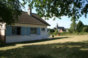 het huis vanuit de tuin bekeken